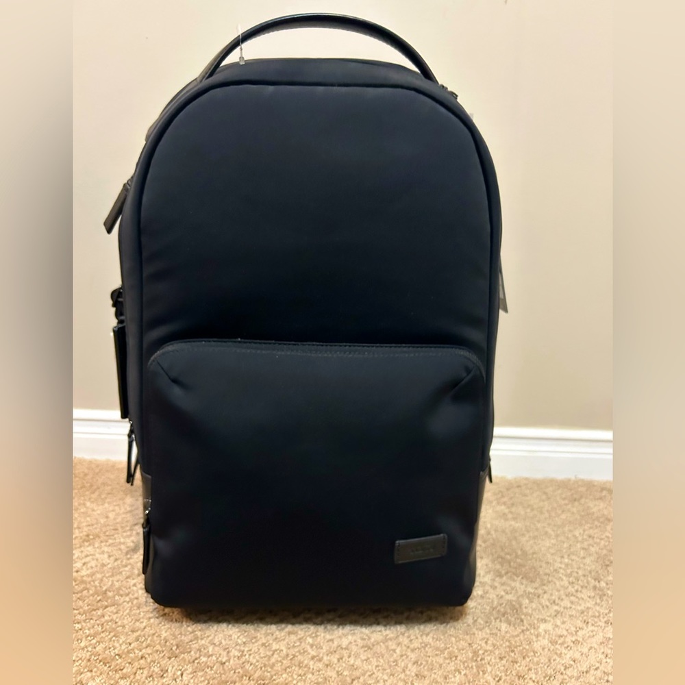 Brand New Tumi backpack still with original tags, never been used